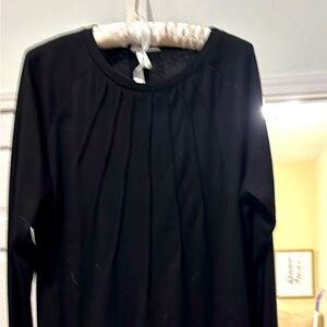 Women’s size L long sleeve black top. Worn once.